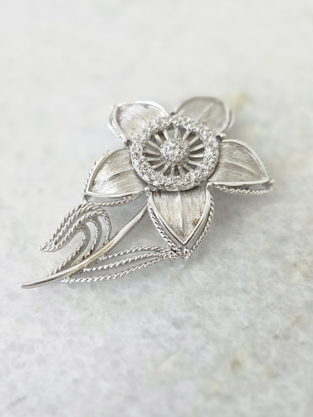 Vintage 1980s Monet Silvertone Flower Brooch Pin with Stem and Leaves 3"
